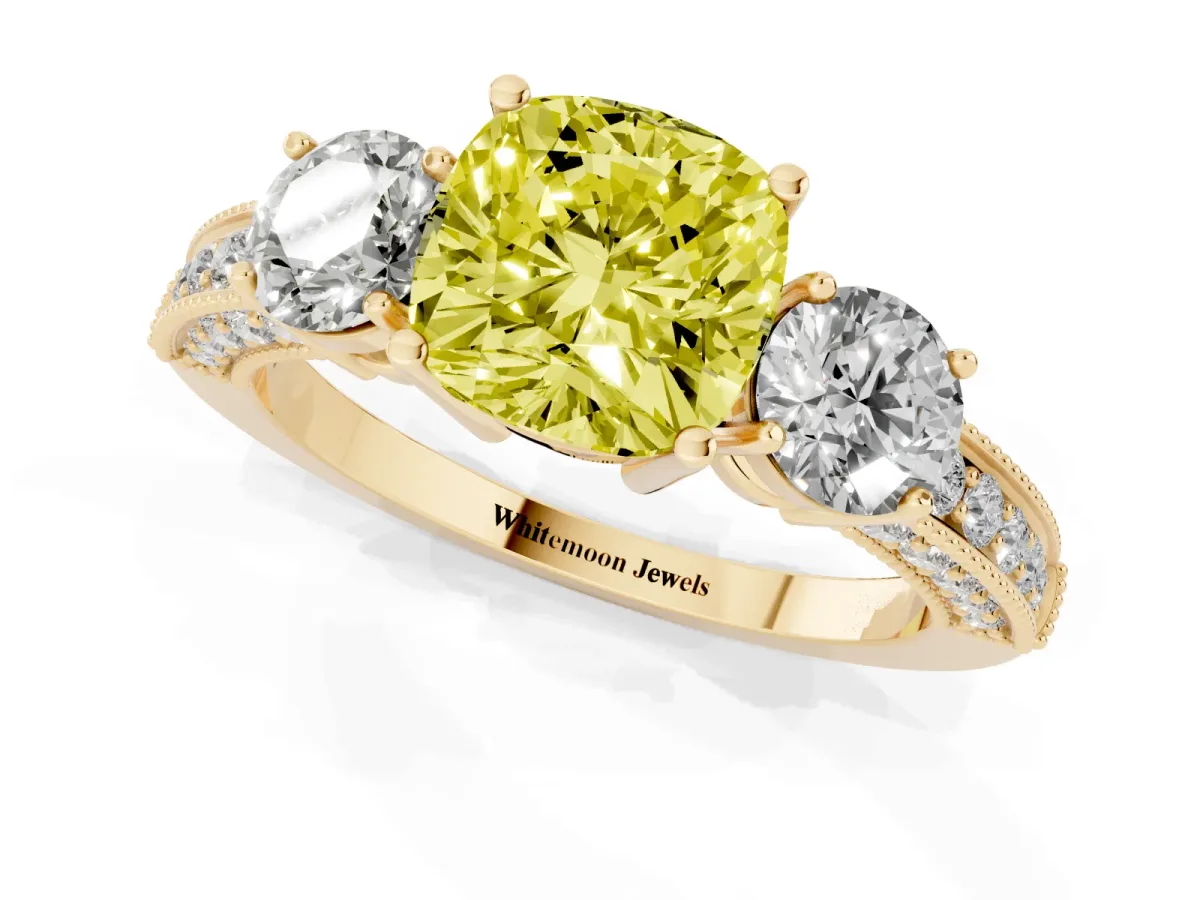 Fancy Yellow Cushion Cut Three-Stone Diamond Ring with Pavé Band and Four-Prong Setting Yellow gold