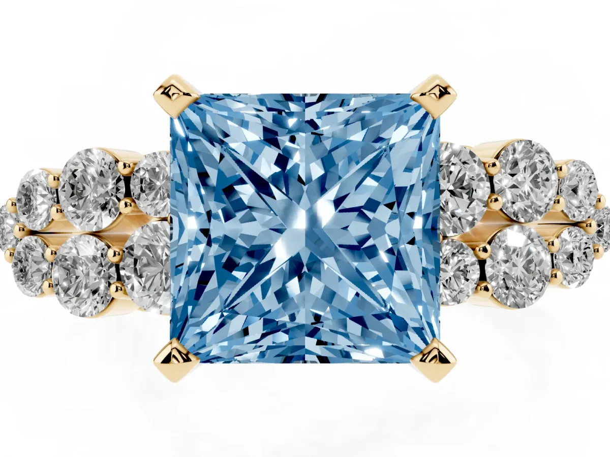 Fancy Blue Princess Cut Cluster Diamond Engagement Ring with Pavé Band and Four-Prong Setting Yellow gold