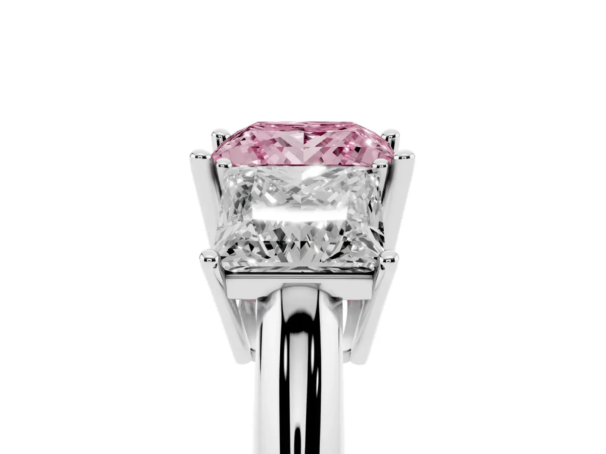 Fancy Pink Three-Stone Princess Cut Cut Diamond Engagement Ring with Prong Setting on a White Gold Band Platinum