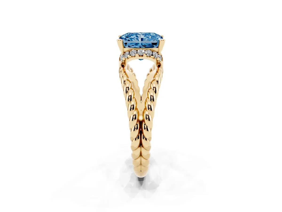 Fancy Blue Radiant Cut Halo Twisted Band Four-Prong Ring Yellow gold