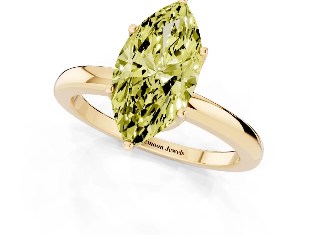 Fancy Yellow Marquise Cut Solitaire Diamond Ring with Six-Prong Setting on a Classic Band Yellow gold