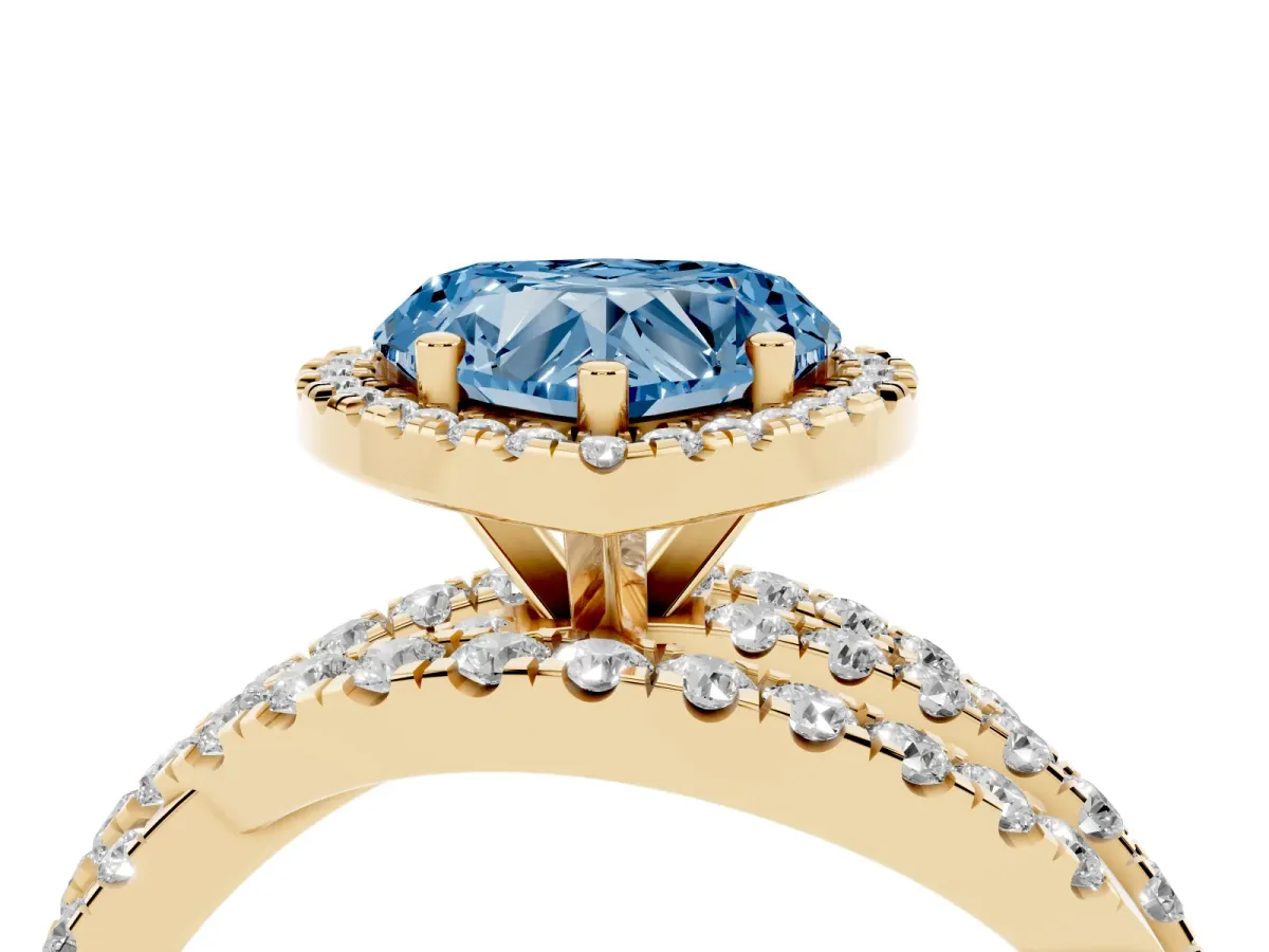 Fancy Blue Heart Cut Diamond Halo Ring with Round Split Shank and Prong Setting Yellow gold