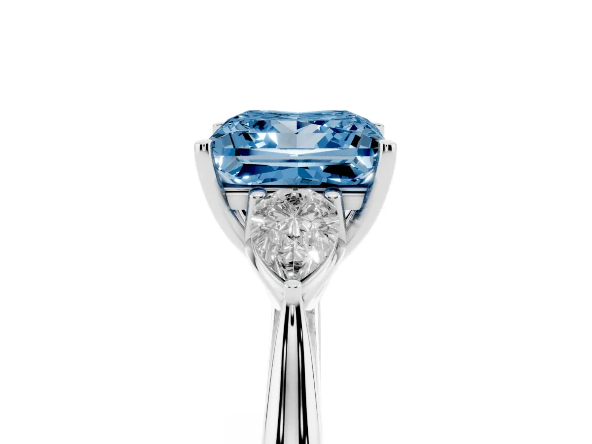 Fancy Blue Three-Stone Princess Cut Brilliant Diamond Solitaire Ring with Tapered Band and Four-Prong Setting White gold
