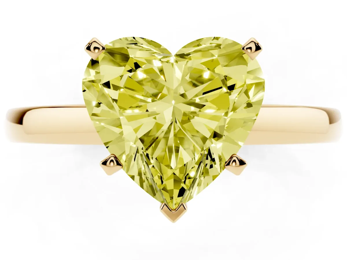 Fancy Yellow Heart Cut Solitaire Diamond Engagement Ring with Four-Prong Setting on a Classic Band Yellow gold