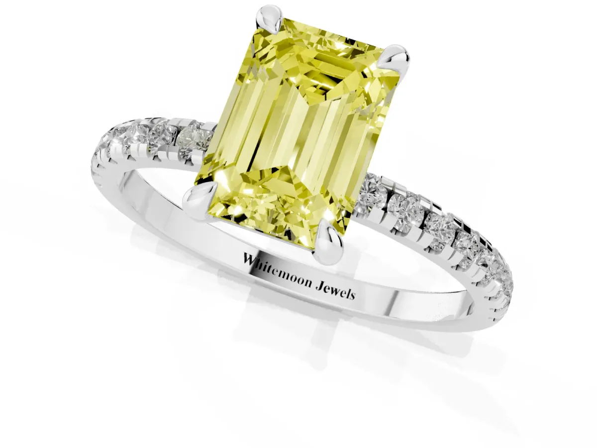 Fancy Yellow Emerald Cut Diamond Brilliant Solitaire Ring with Pavé Band and Four-Prong Setting White gold