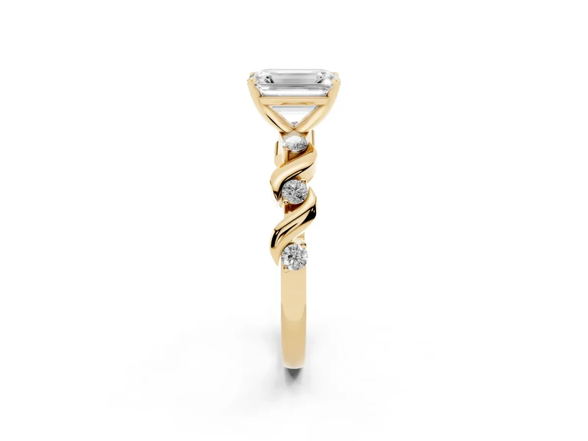 Emerald Cut Diamond Solitaire Twisted Band with Round Accents and Prong Setting Yellow gold