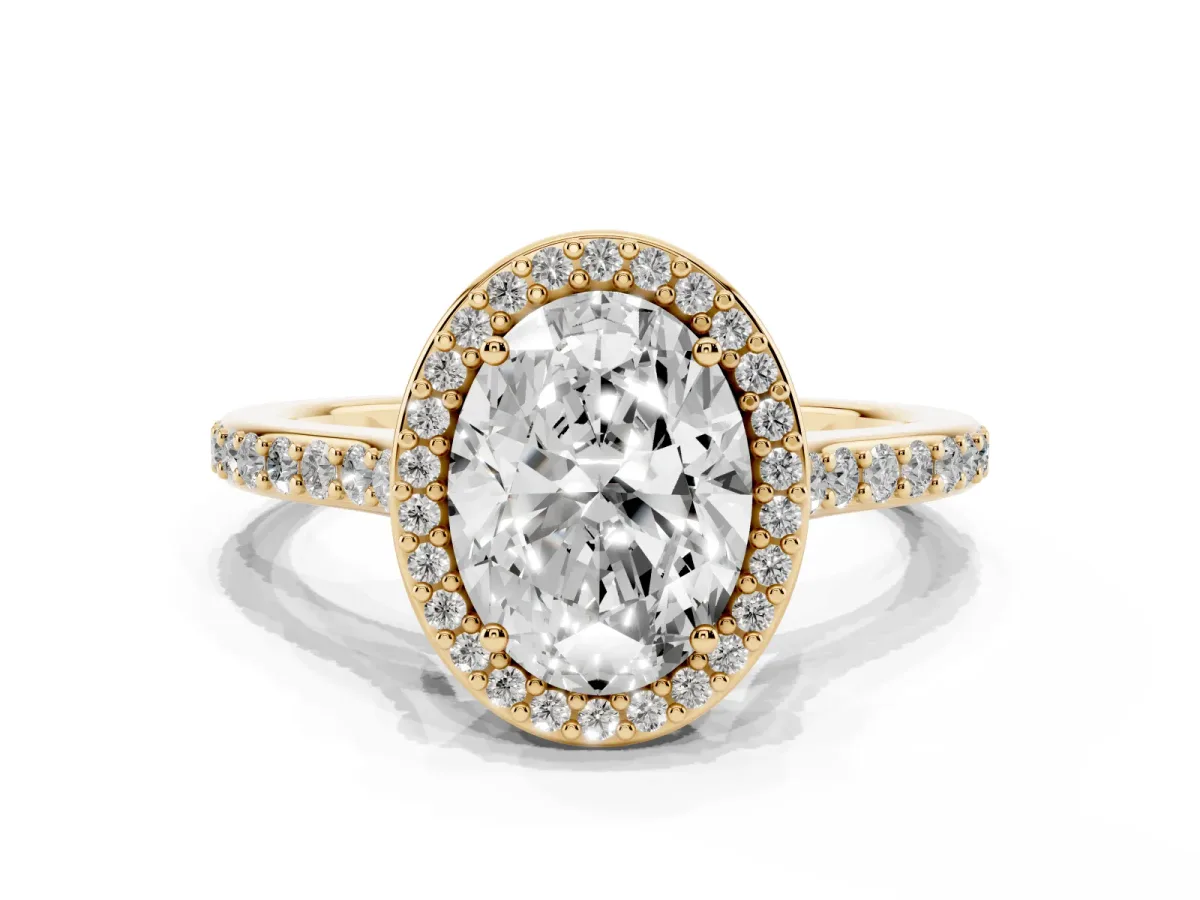 Oval Cut Diamond Halo Engagement Ring with Round Pavé Shoulders and Prong Setting Yellow gold