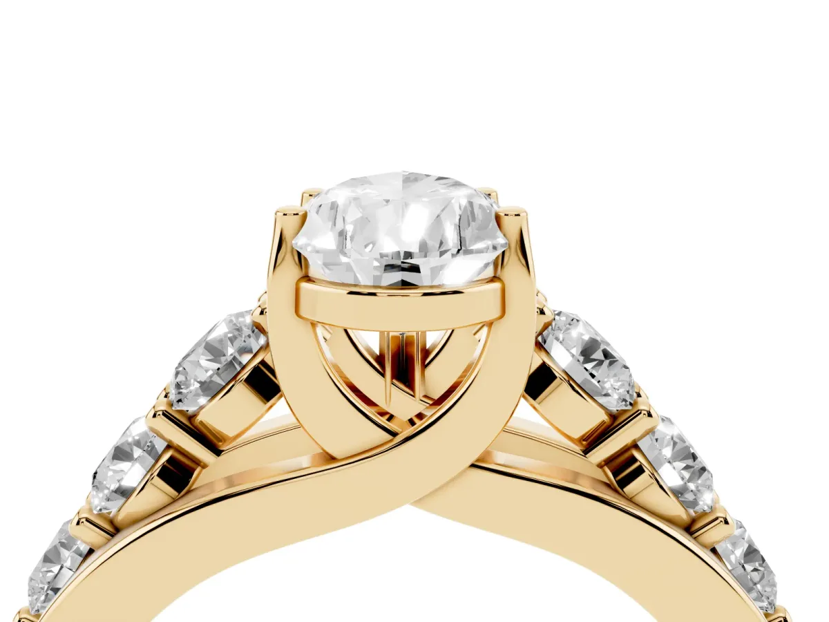 Pear Cut Diamond Engagement Ring with Pavé Band and Four-Prong Setting Yellow gold