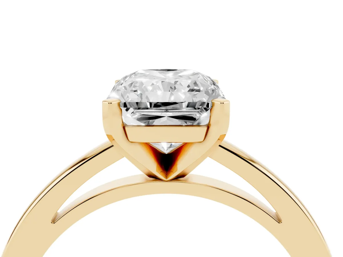 Radiant Cut Solitaire Diamond Engagement Ring with Four-Prong Setting on a Classic Band Yellow gold
