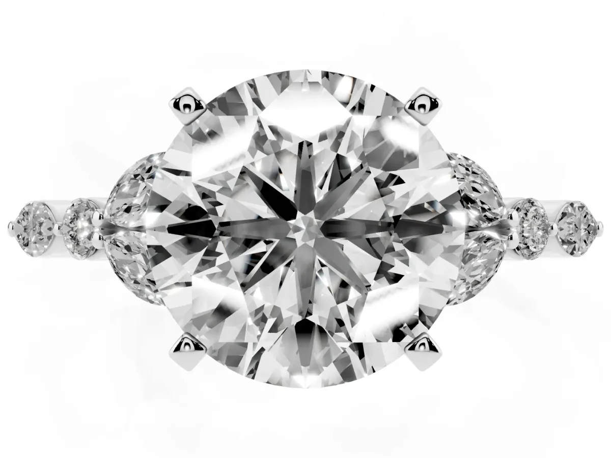 Round Cut Diamond Solitaire Ring with Side Stones and Four-Prong Setting White gold