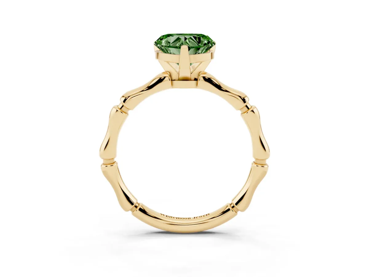 Fancy Green Heart Cut Solitaire Diamond Ring with Bamboo Band and Four-Prong Setting Yellow gold