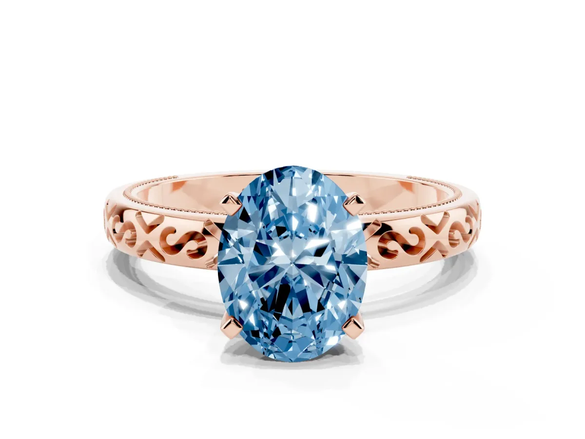 Fancy Blue Oval Cut Solitaire Engagement Ring with Scrollwork Band and Four-Prong Setting Rose gold