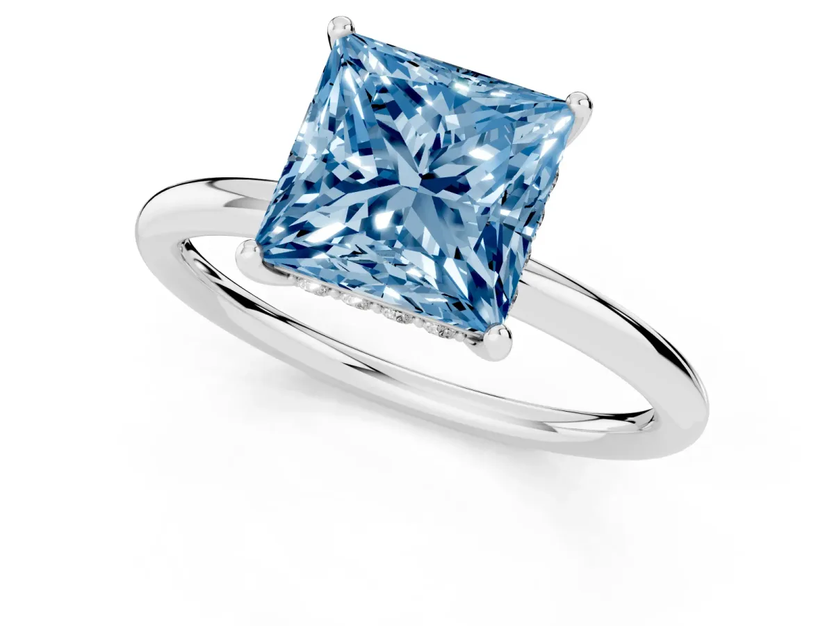Fancy Blue Princess Cut Solitaire Diamond Ring with a Classic Band and Four-Prong Setting Silver