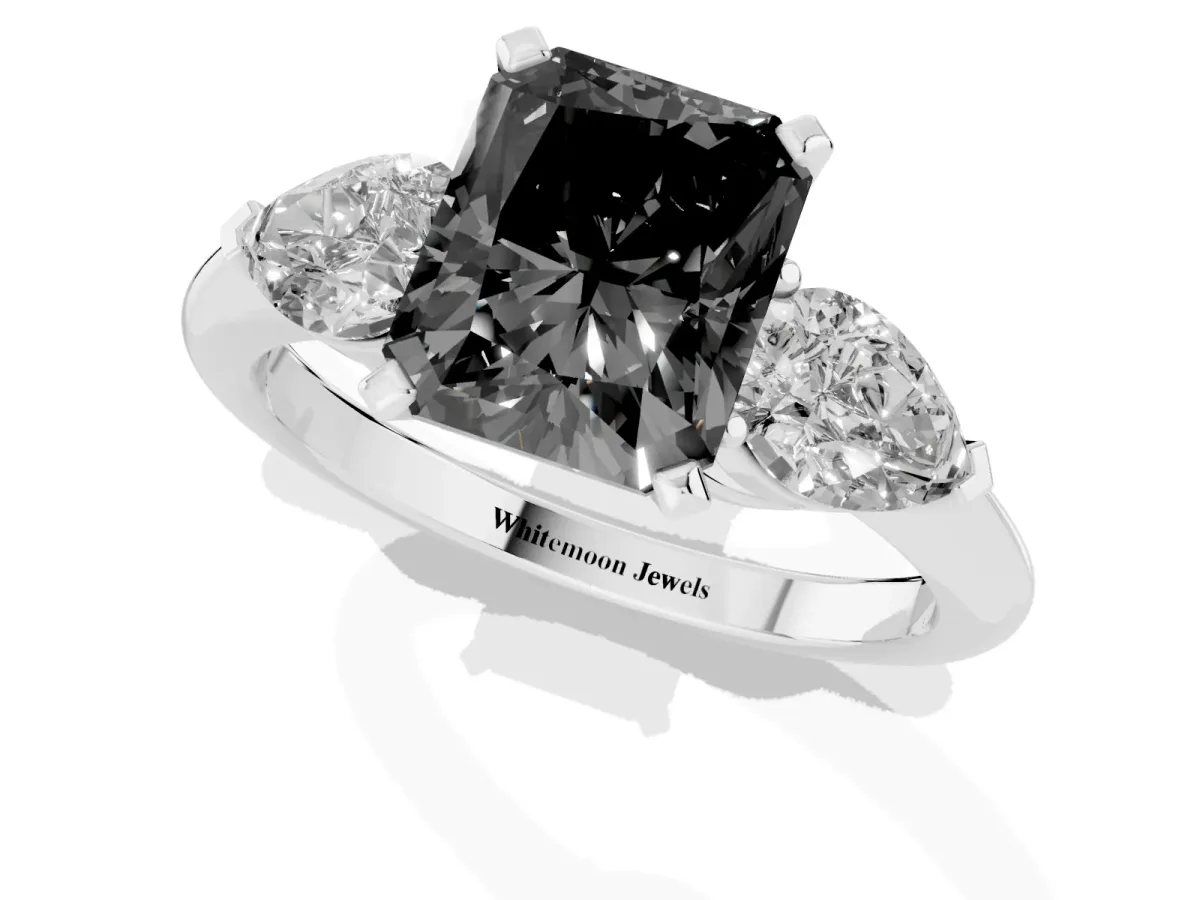Fancy Black Three-Stone Radiant Cut Diamond Ring with Pear Side Stones and Four-Prong Setting Silver