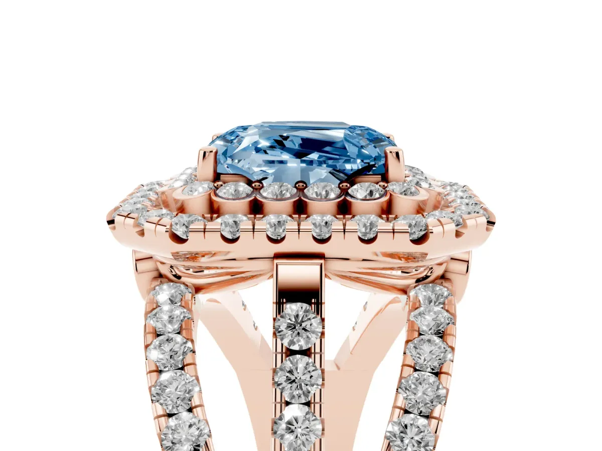 Fancy Blue Emerald Cut Diamond Double Halo Ring with Round Pavé Split Shank and Prong Setting Rose gold