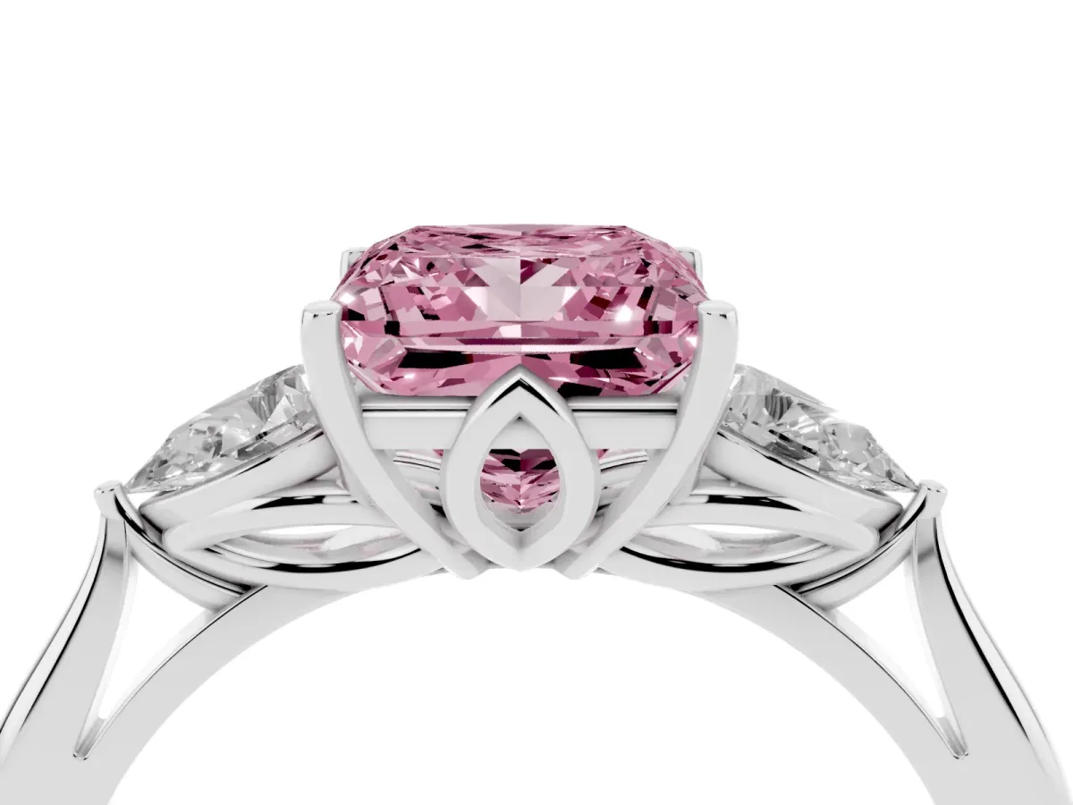 Fancy Pink Three-Stone Princess Cut Diamond Ring with Pear Side Stones in Four-Prong Setting Silver