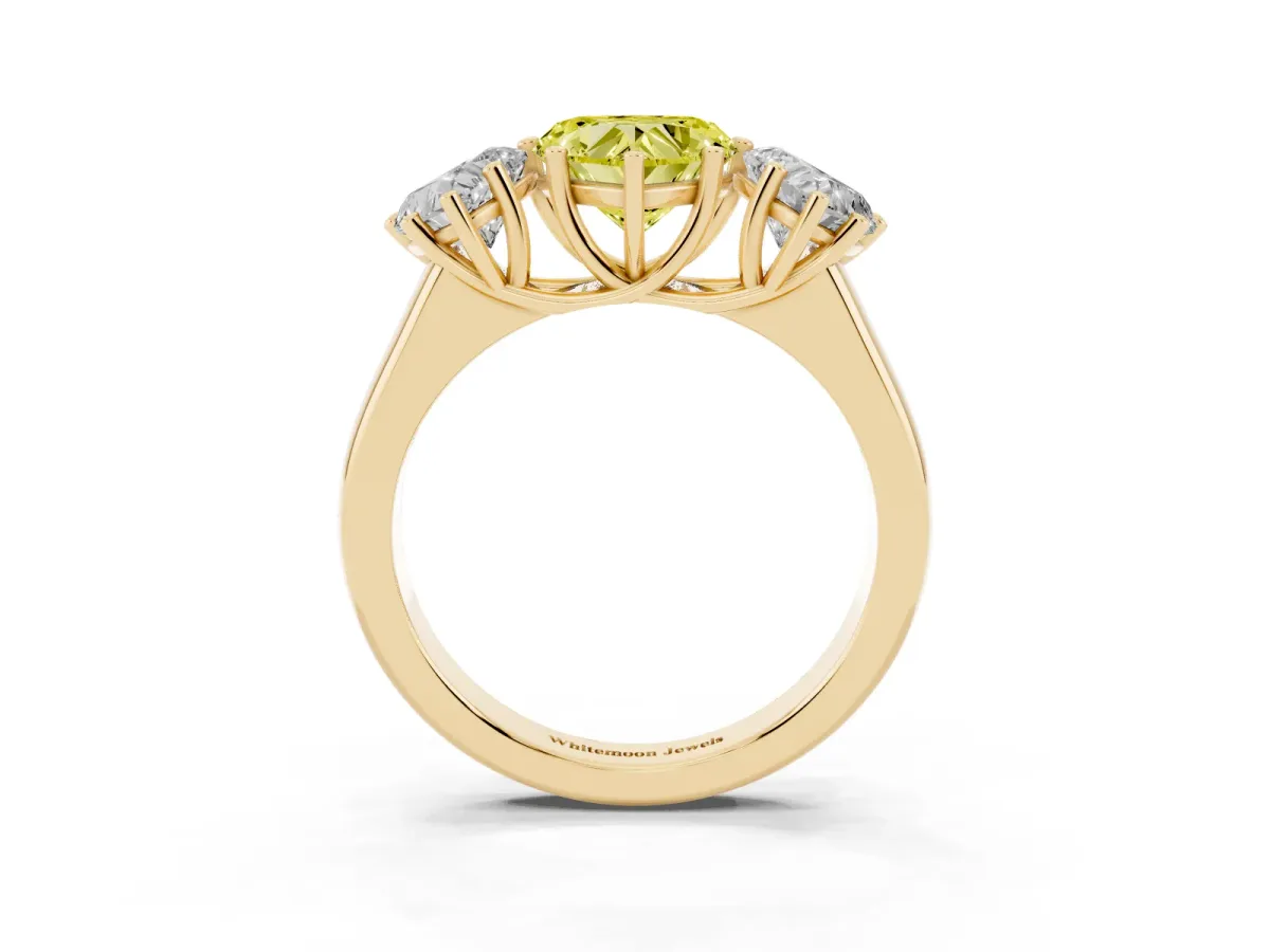 Fancy Yellow Heart Cut Three-Stone Diamond Ring with Prong Setting on a Classic Band Yellow gold