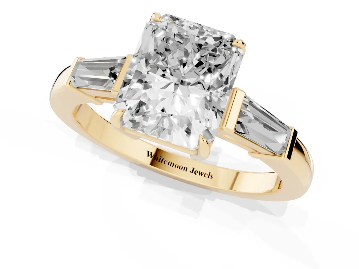 Radiant Cut Diamond Three-Stone Ring with Tapered Baguette Side Stones and Prong Setting Yellow gold