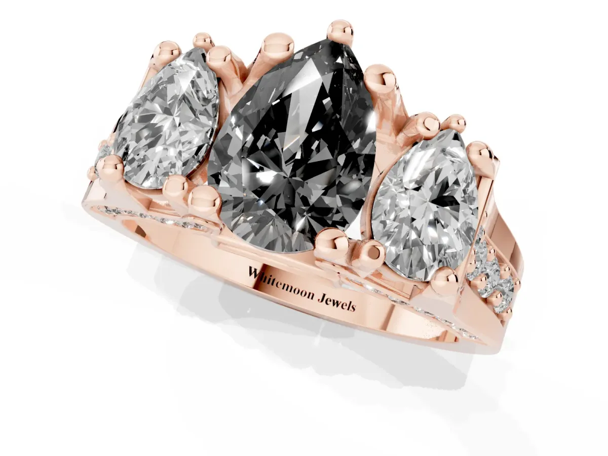 Fancy Black Pear Cut Diamond Three-Stone Ring with Channel Set Band and Four-Prong Setting Rose gold