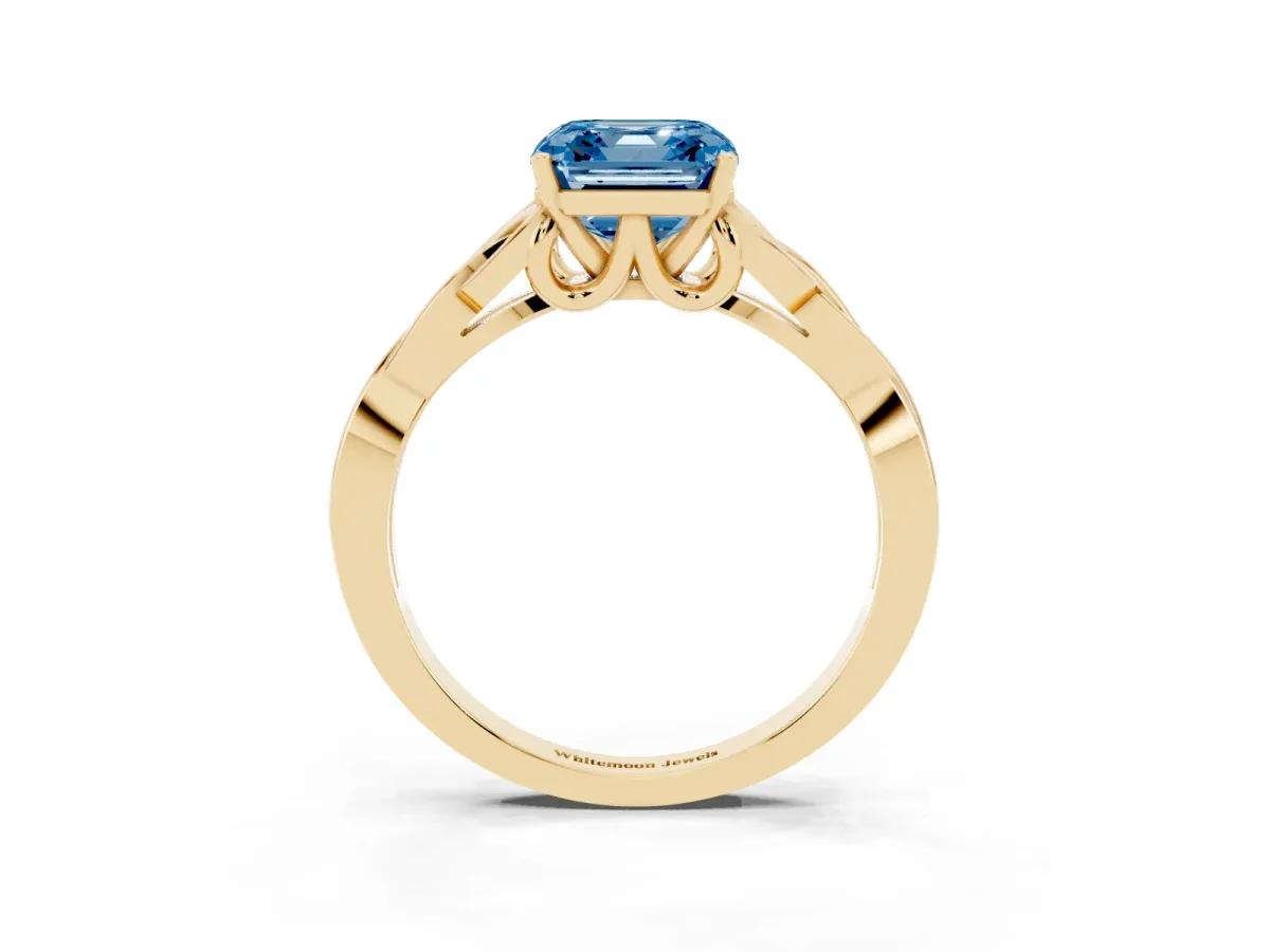 Fancy Blue Asscher Cut Diamond Solitaire Engagement Ring with Celtic Knot Band and Four-Prong Setting Yellow gold