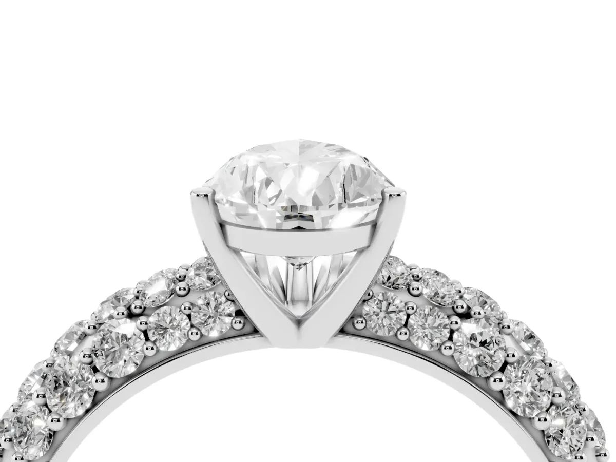 Pear Cut Diamond Pavé Band Solitaire Ring with Four-Prong Setting Silver