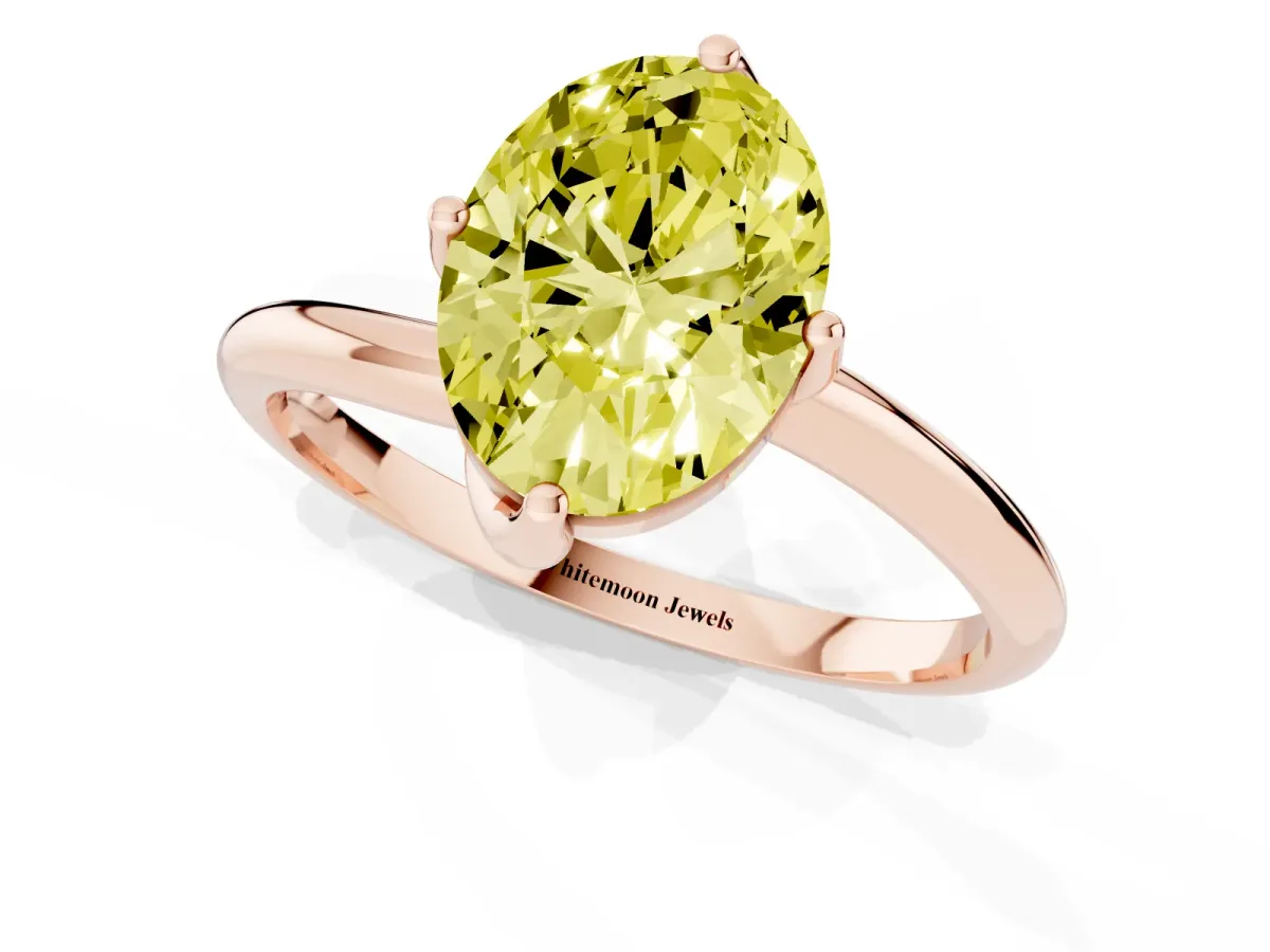Fancy Yellow Oval Cut Diamond Solitaire Engagement Ring with Four-Prong Setting and Classic Band Rose gold