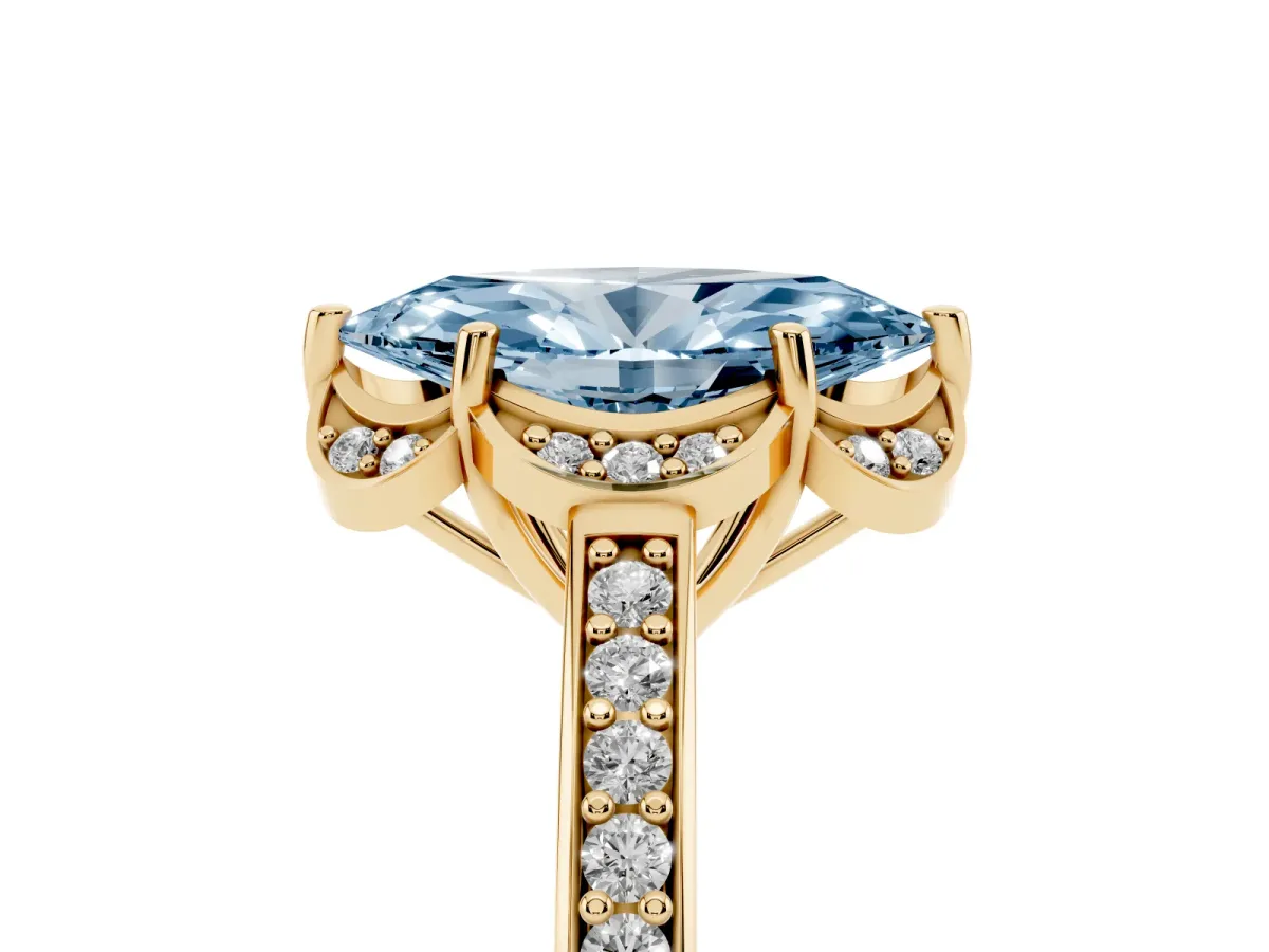 Fancy Blue Marquise Cut Cut Halo Diamond Ring with Channel Set Band and Four-Prong Setting Yellow gold