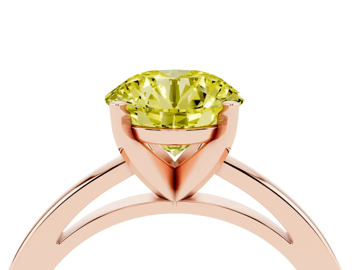 Fancy Yellow Round Cut Solitaire Diamond Engagement Ring with Four-Prong Setting on a Classic Band Rose gold