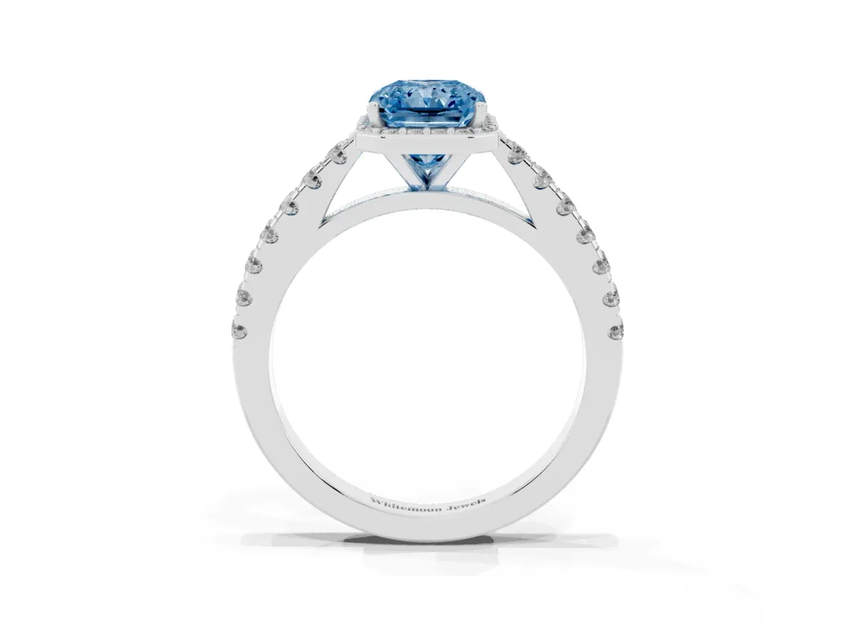 Fancy Blue Radiant Cut Cut Halo Diamond Engagement Ring with Pave Band and Four-Prong Setting Silver