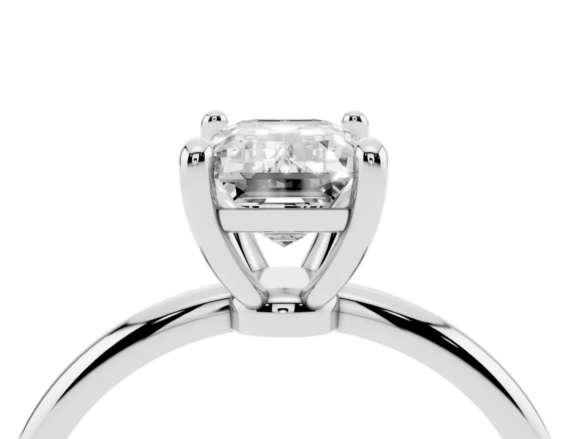 Emerald Cut Solitaire Diamond Ring with 4-Prong Setting on a Classic Band Silver