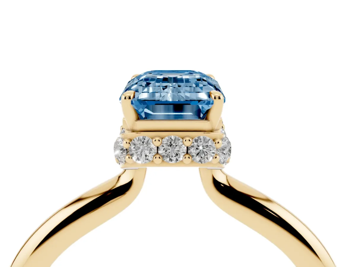 Fancy Blue Emerald Cut Brilliant Solitaire Engagement Ring with Six-Prong Setting and Classic Band Yellow gold