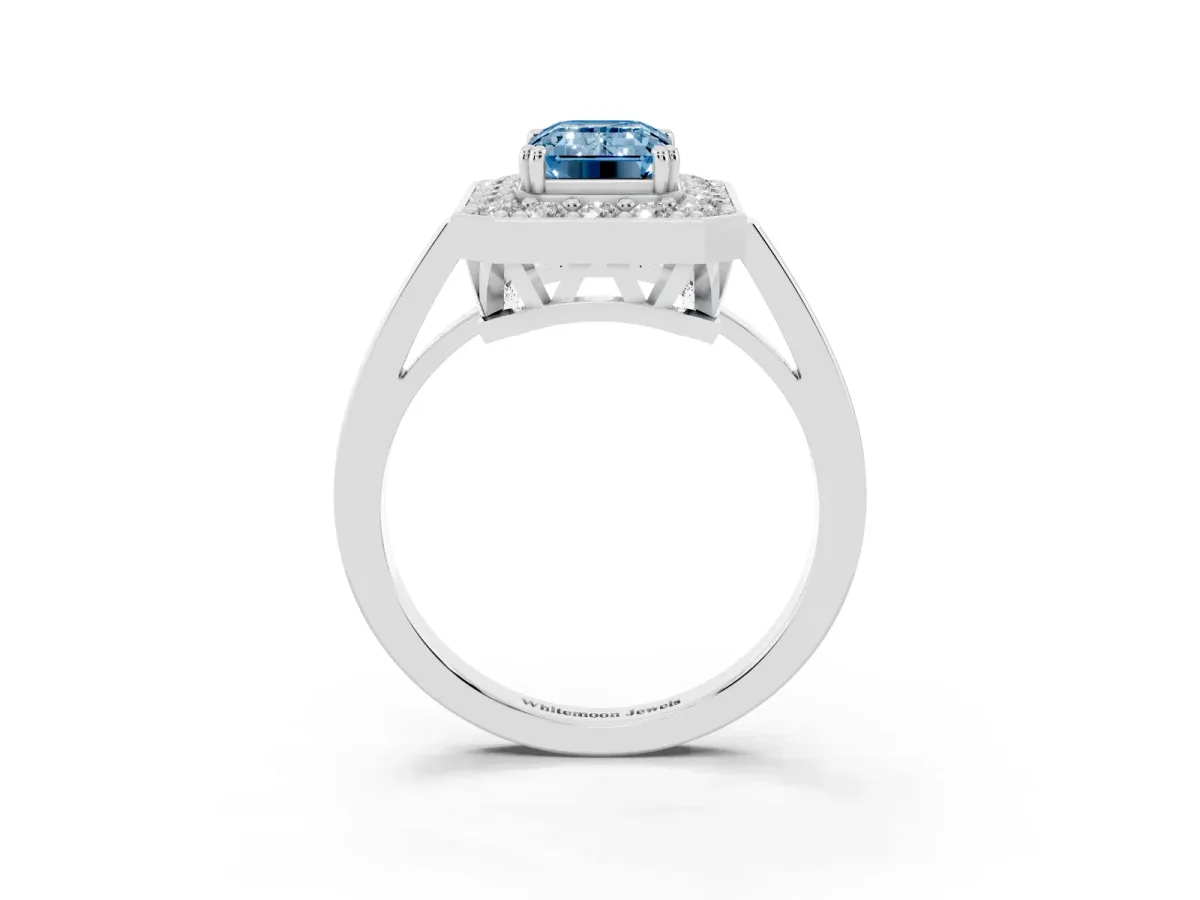 Fancy Blue Emerald Cut Diamond Halo Ring with Split Shank and Four-Prong Setting Silver
