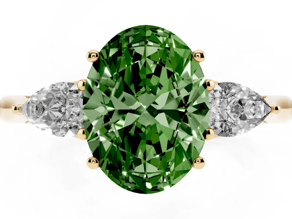 Fancy Green Oval Cut Diamond Three-Stone Ring with Pear Side Stones and Prong Setting Yellow gold
