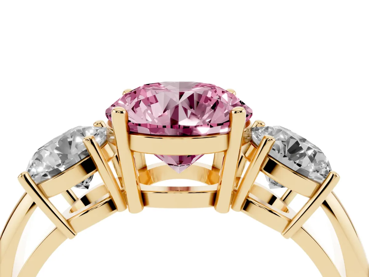 Fancy Pink Three-Stone Round Cut Cut Diamond Engagement Ring with Prong Setting on a White Gold Band Yellow gold