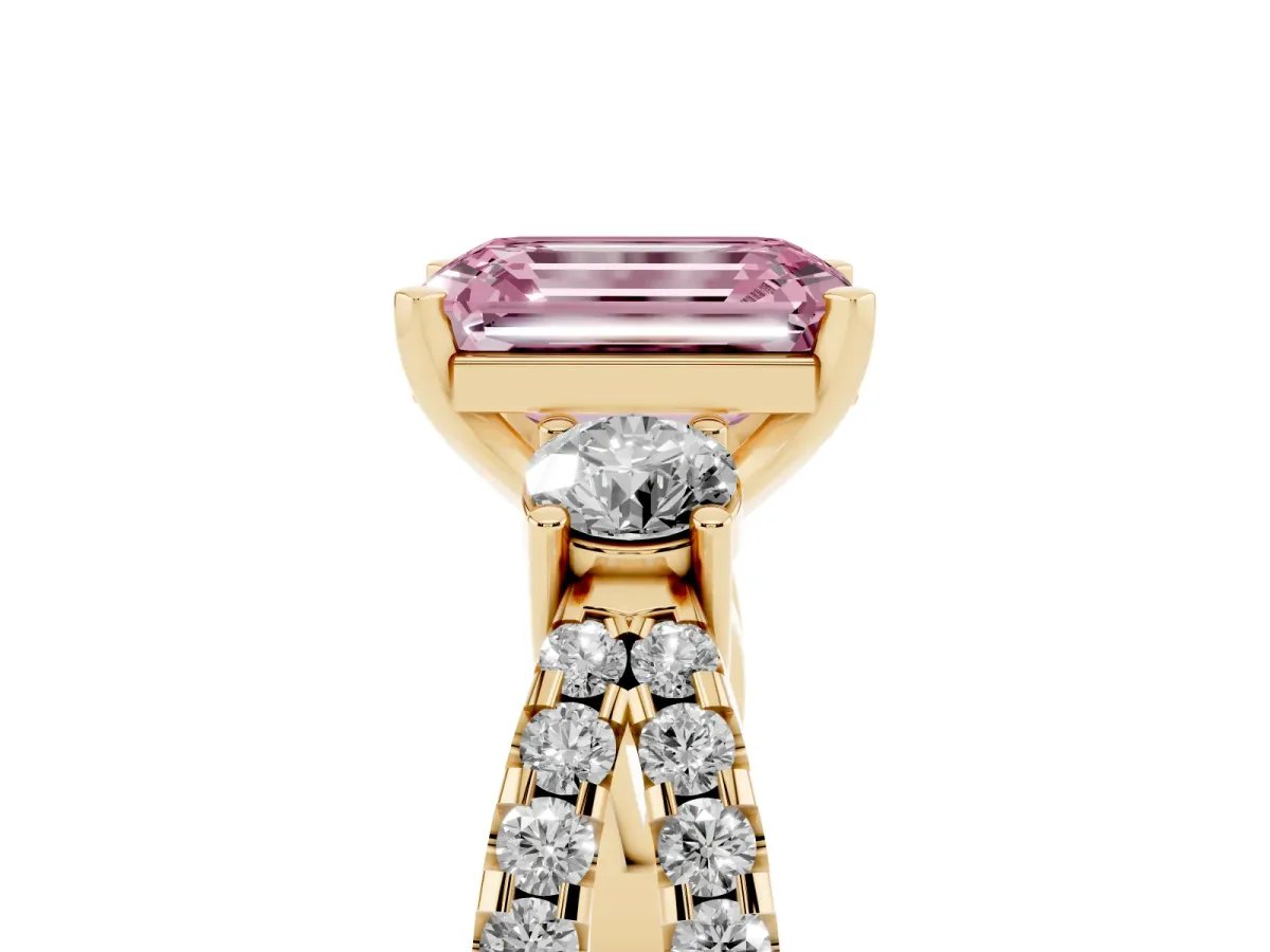 Fancy Pink Emerald Cut Diamond Three-Stone Ring with Pavé Split Shank and Four-Prong Setting Yellow gold
