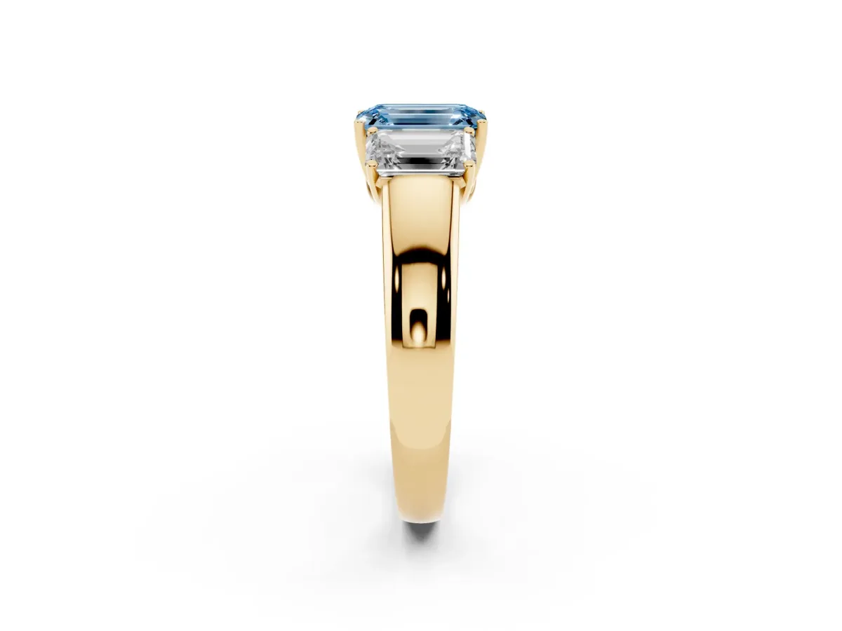 Fancy Blue Three-Stone Emerald Cut Cut Diamond Ring with Prong Setting and Classic Band Yellow gold