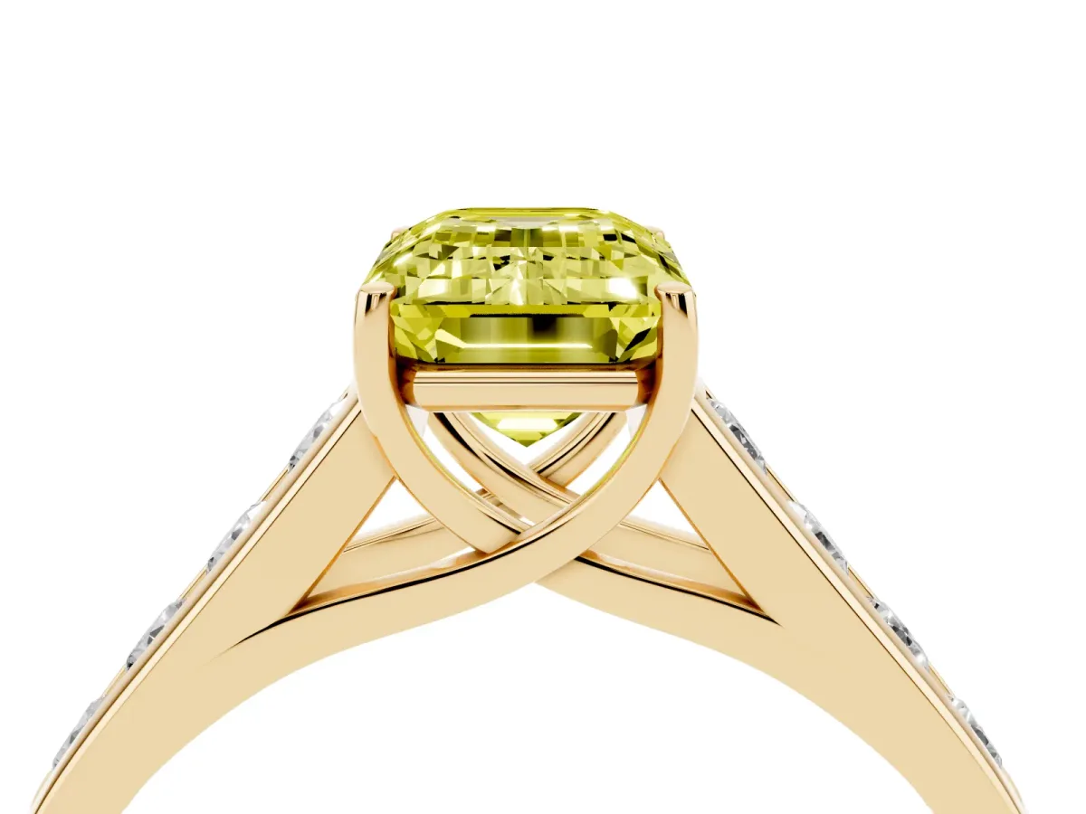 Fancy Yellow Emerald Cut Brilliant Channel-Set Solitaire Ring with Four-Prong Setting Yellow gold