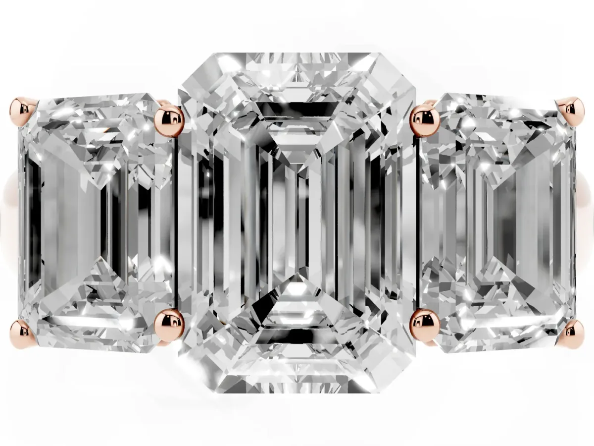 Emerald Cut Three-Stone Diamond Ring with Prong Setting on a Classic Band Rose gold