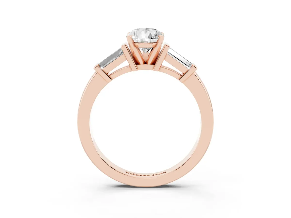 Pear Cut Cut Diamond Solitaire Ring with Tapered Baguette Accents and Four-Prong Setting Rose gold