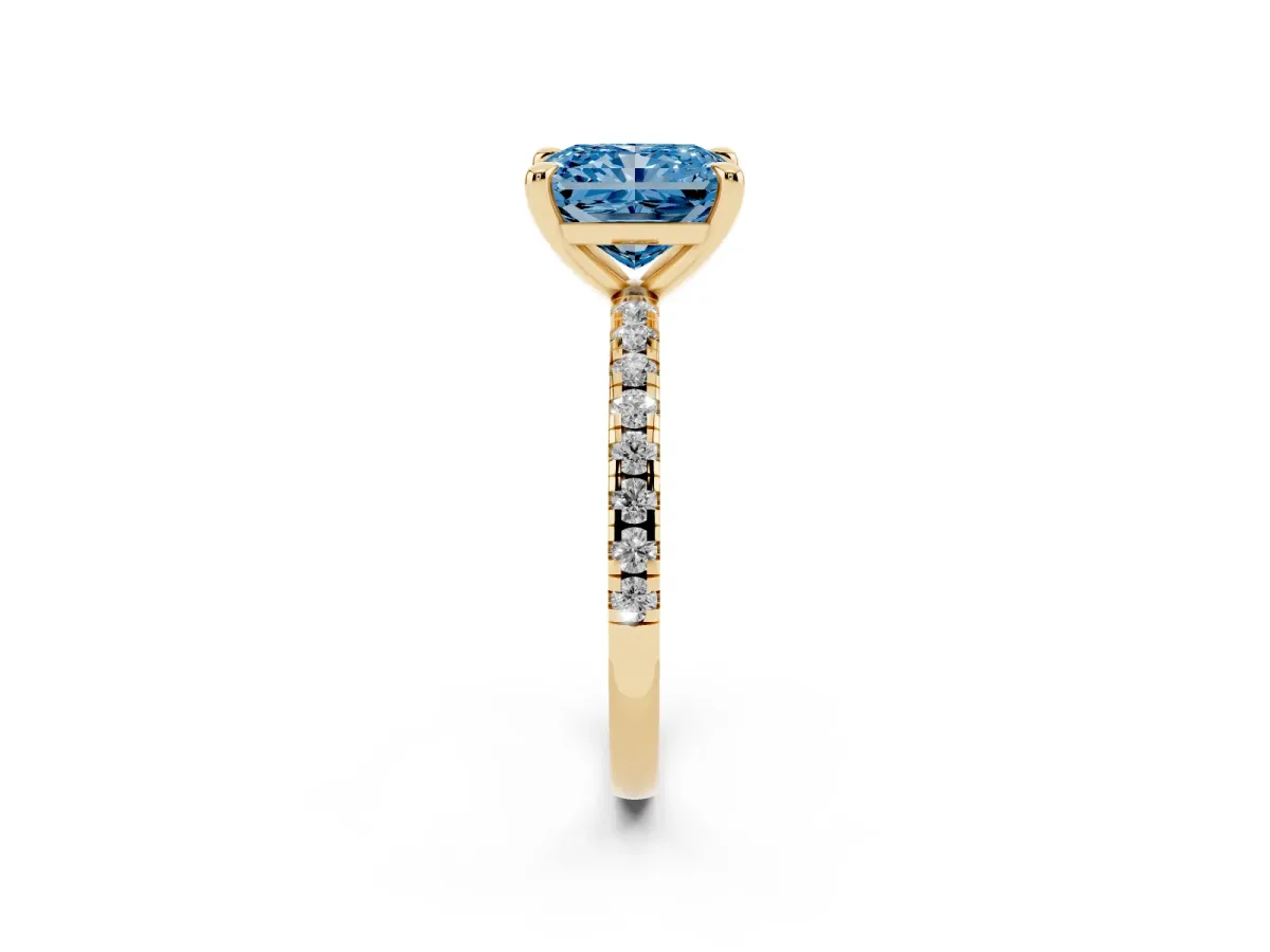 Fancy Blue Radiant Cut Diamond Brilliant Solitaire Ring with Pavé Band and Four-Prong Setting Yellow gold