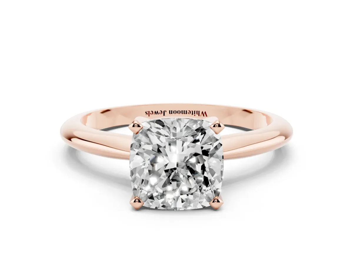 Cushion Cut Cut Solitaire Ring with Four-Prong Setting on a Classic Band Rose gold