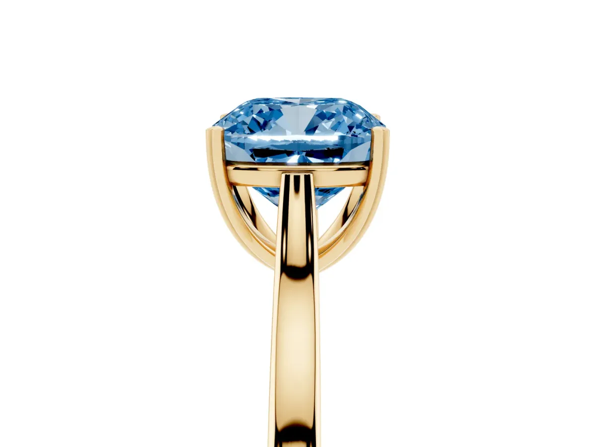 Fancy Blue Cushion Cut Solitaire Heart Prong Engagement Ring with Tapered Band Yellow gold