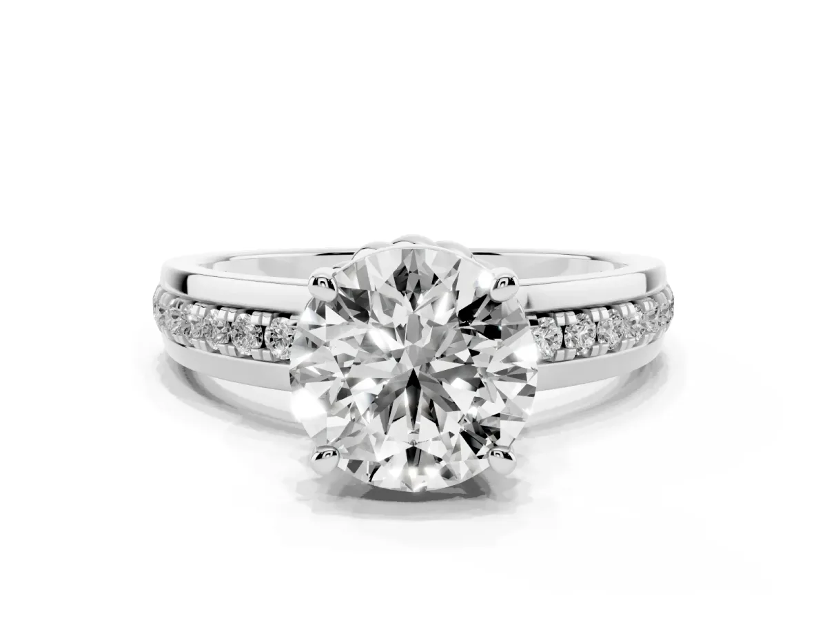 Round Cut Solitaire Diamond Ring with Channel Set Band and Six-Prong Setting Silver