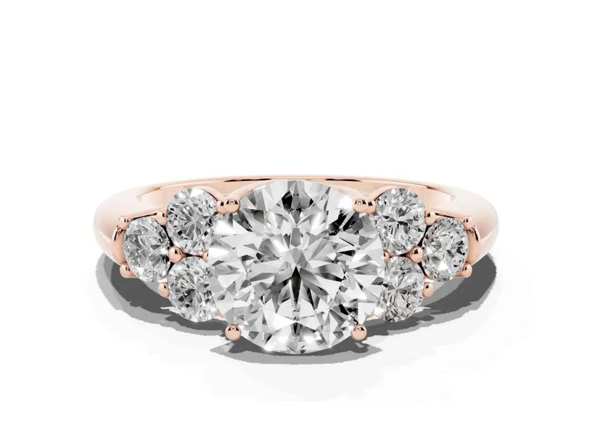 Round Cut Cut Diamond Cluster Ring with Round Accent Stones and Prong Setting on a Classic Band Rose gold