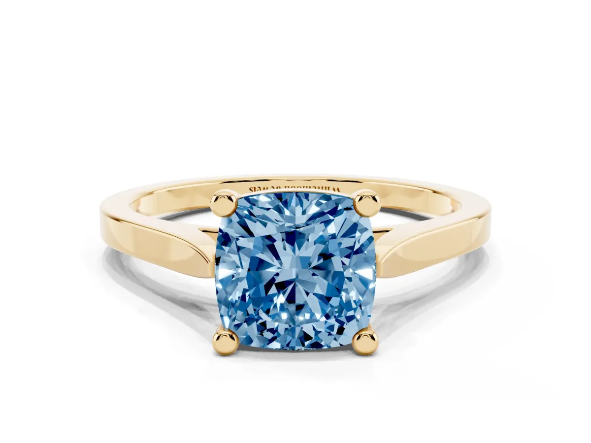Fancy Blue Cushion Cut Solitaire Diamond Ring with Four-Prong Setting and Tapered Band Yellow gold