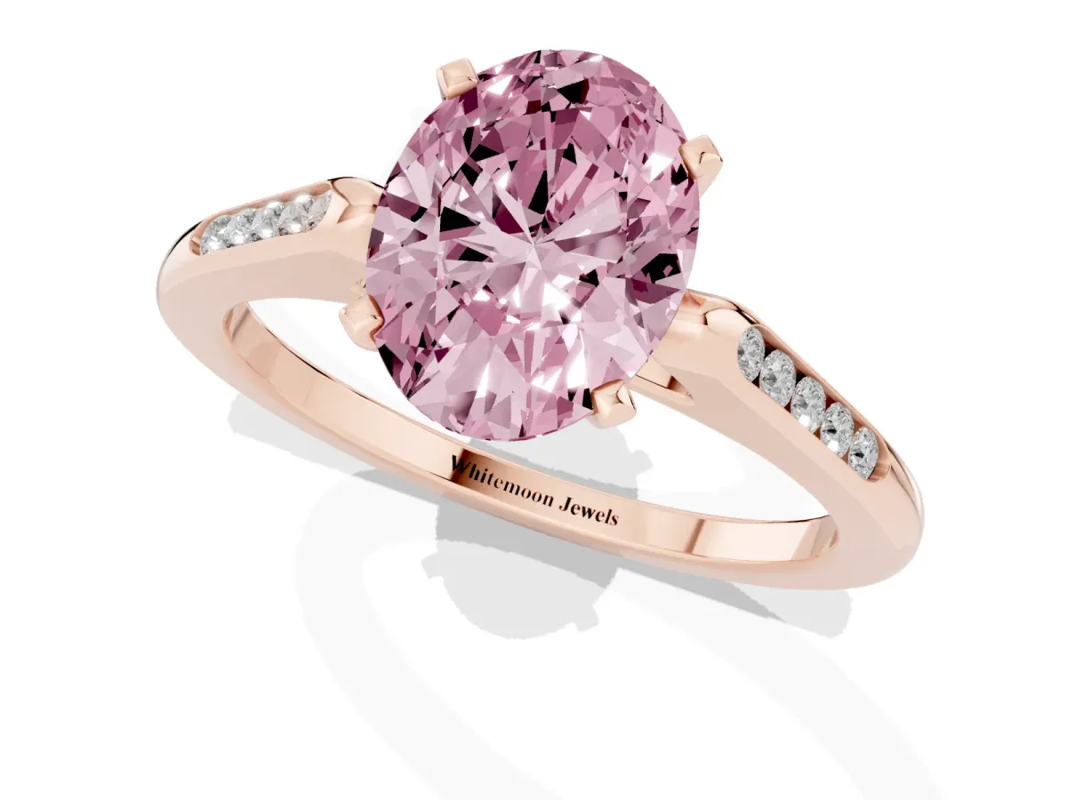 Fancy Pink Oval Cut Diamond Solitaire Ring with Channel Set Round Band and Prong Setting Rose gold