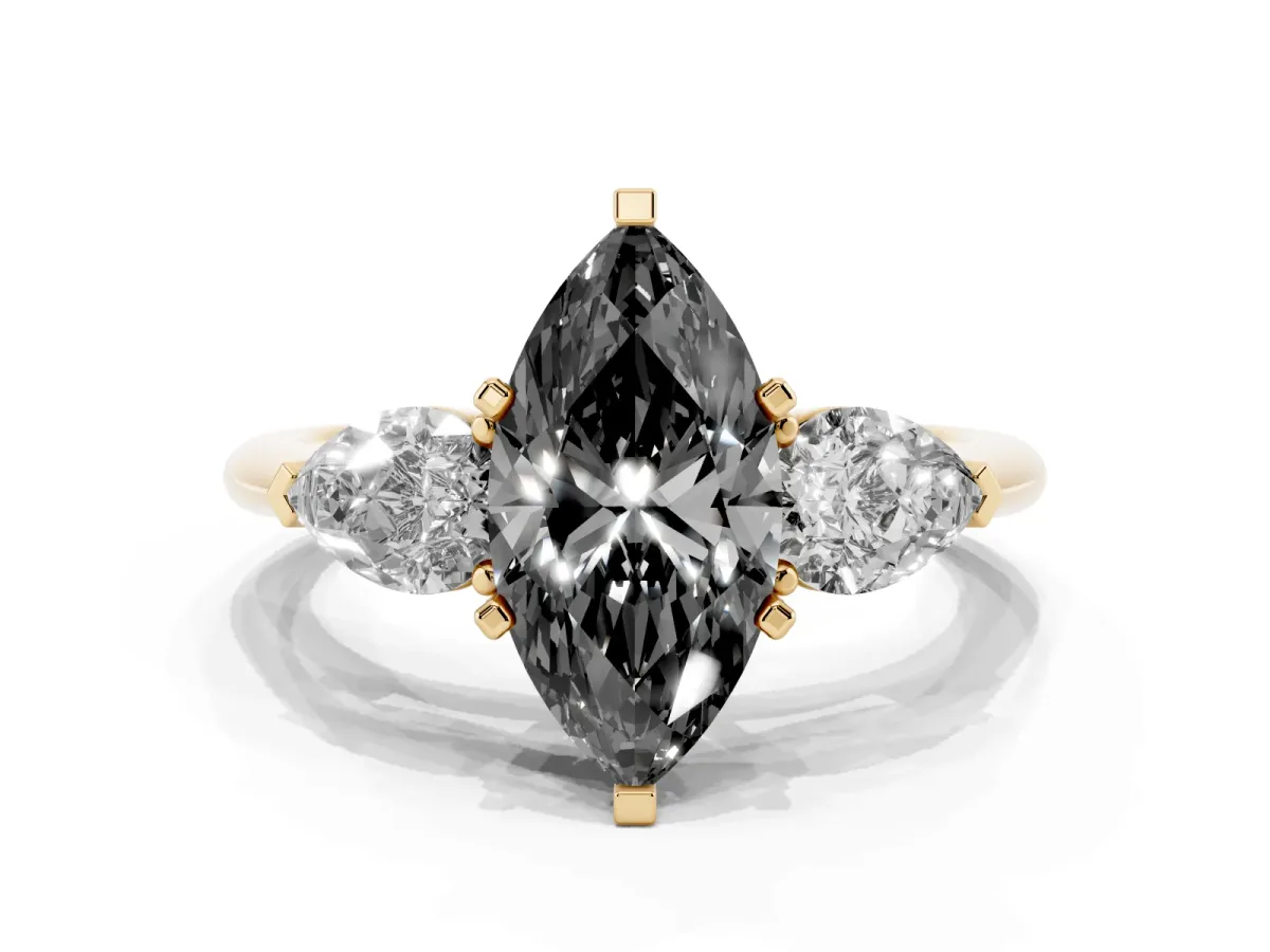 Fancy Black Three-Stone Marquise Cut Diamond Ring with Pear Side Stones and Four-Prong Setting Yellow gold
