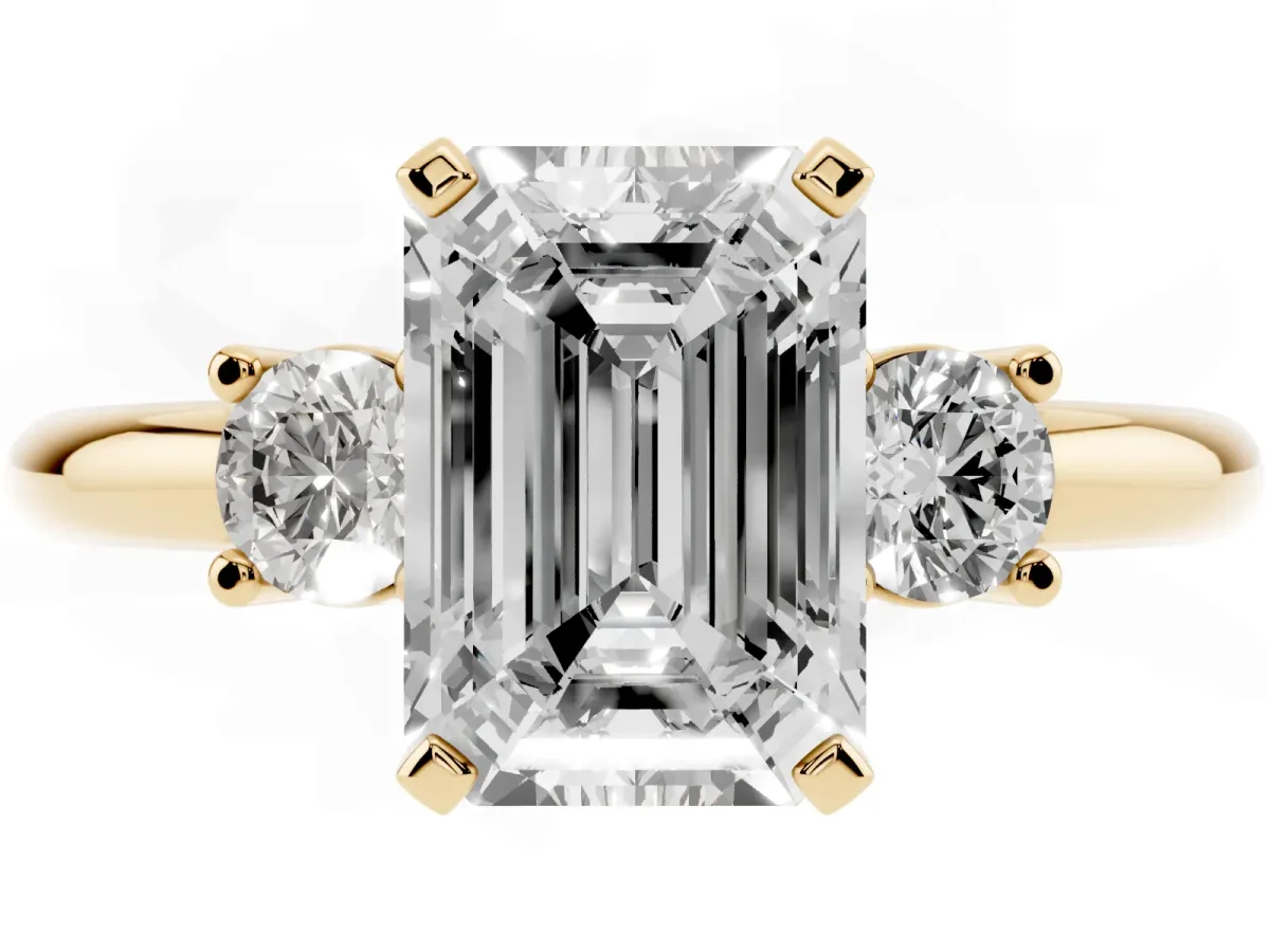 Three-Stone Emerald Cut Cut Diamond Solitaire with Prong Setting and Classic Band Yellow gold