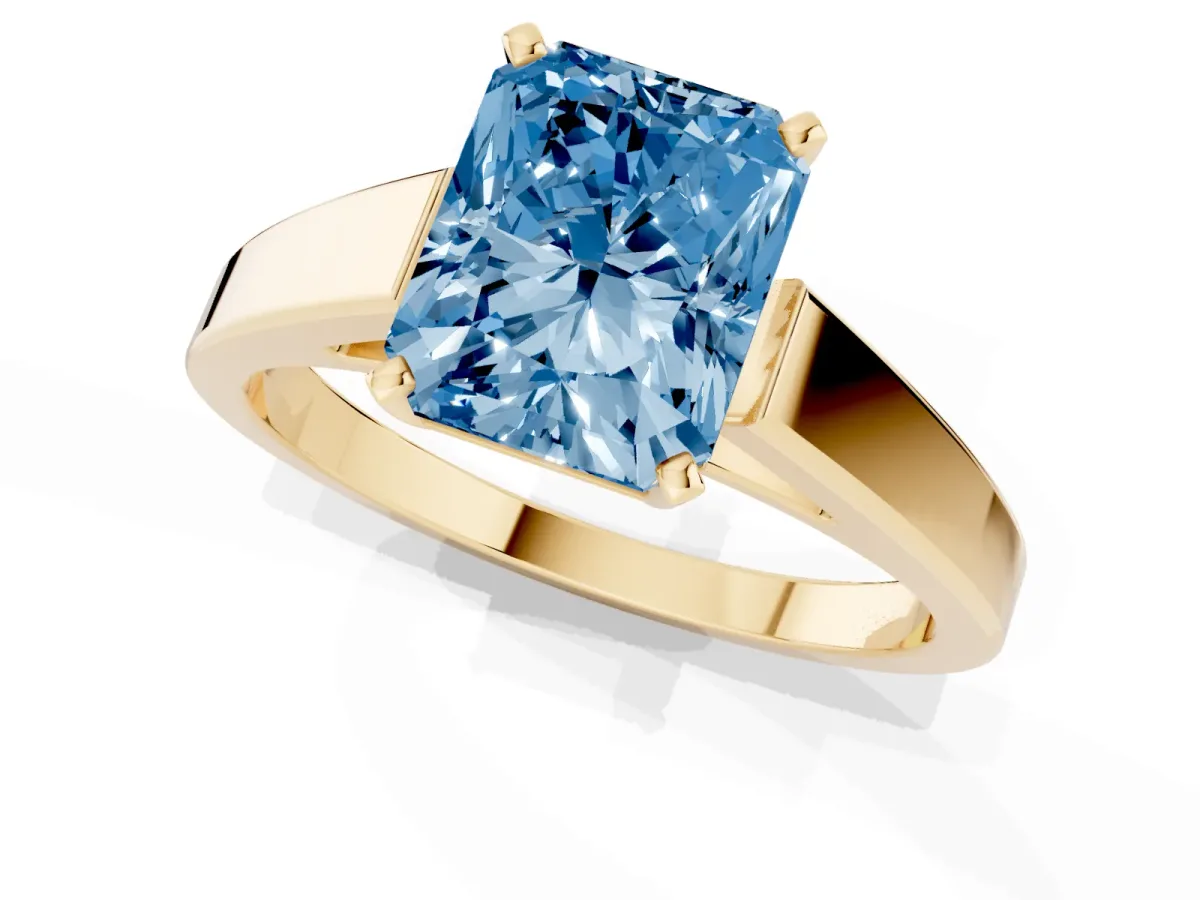 Fancy Blue Radiant Cut Solitaire Engagement Ring with Four-Prong Setting and Tapered Band Yellow gold