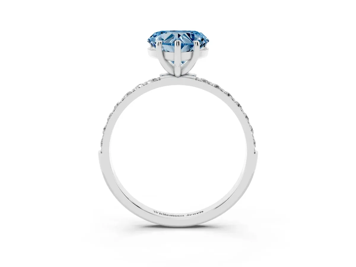 Fancy Blue Heart Cut Diamond Solitaire Ring with Round Pavé Shoulders and Prong Setting Silver